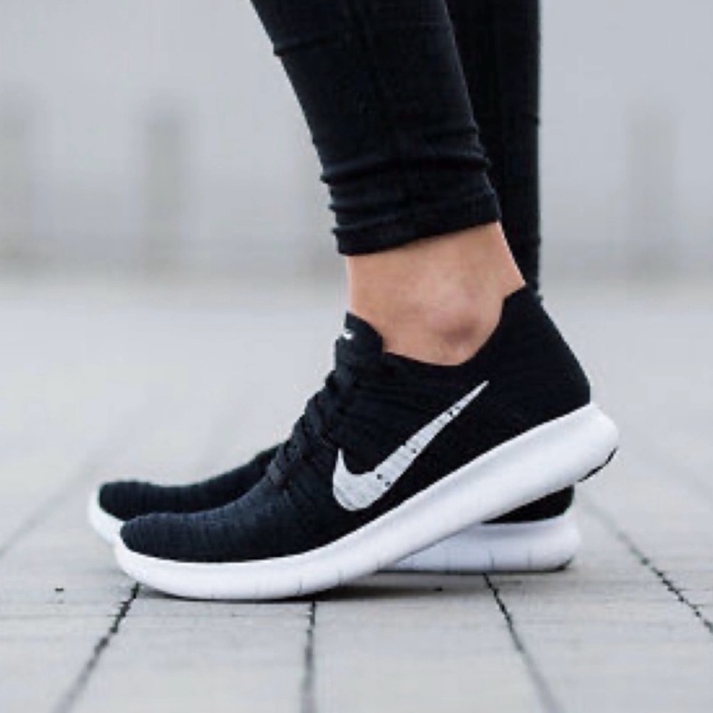 Brand new Nike flyknit black and white running shoes